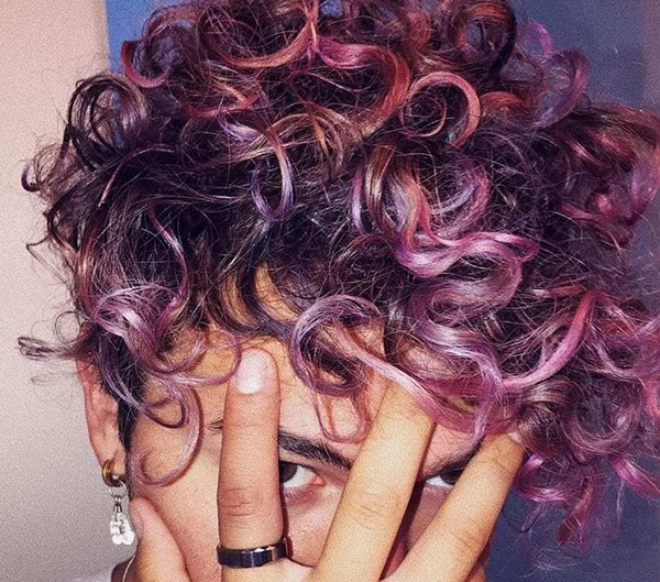 Purple Highlights for a Fun, Curly Look