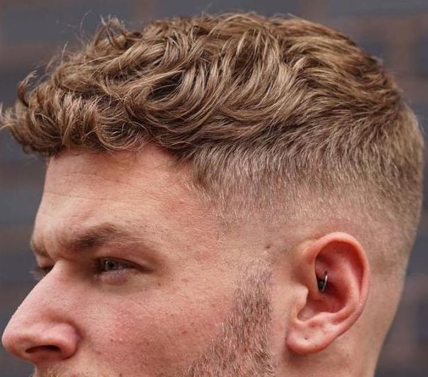 8. Dirty Blonde Top Fade with Curly Hair